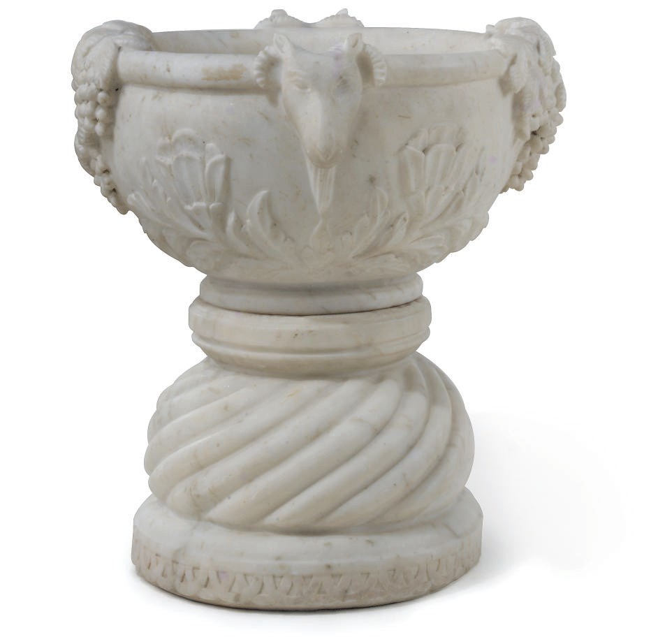 AN INDIAN WHITE-MARBLE URN ON STAND