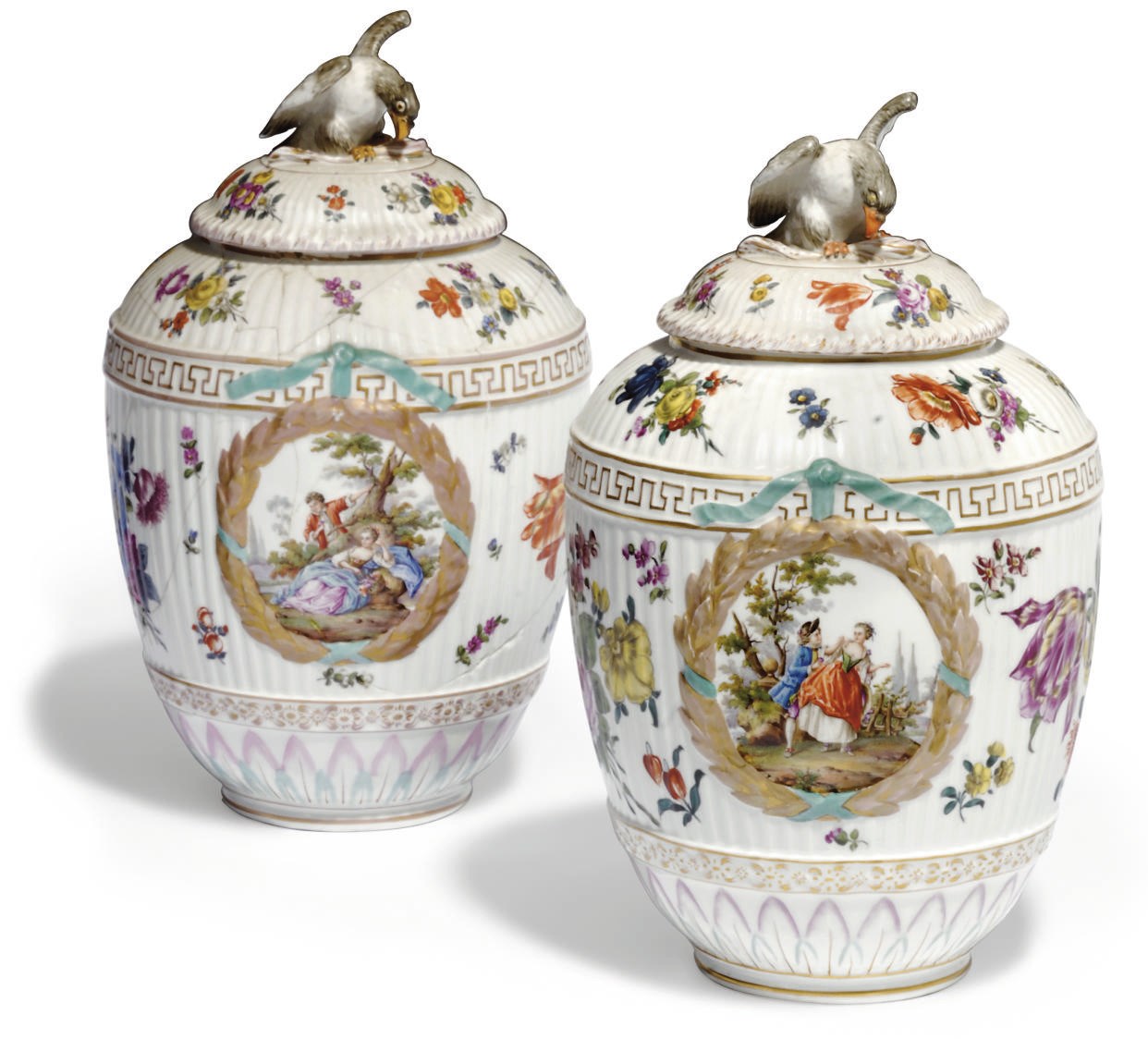 TWO BERLIN OVIFORM VASES AND COVERS
