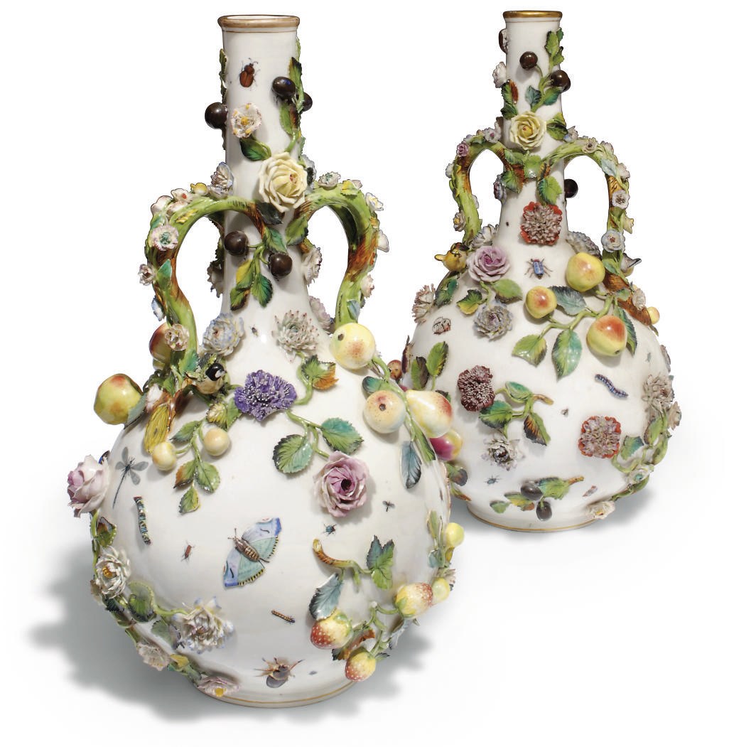 A PAIR OF GERMAN PORCELAIN TWO-HANDLED GLOBULAR VASES