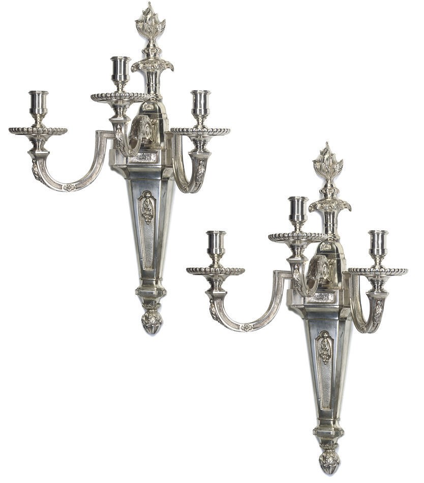 A SET OF FOUR SILVERED-BRASS THREE-LIGHT WALL-LIGHTS