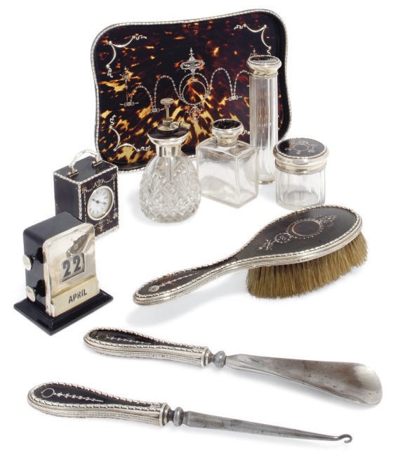 A SILVER AND TORTOISESHELL DRESSING TABLE SET