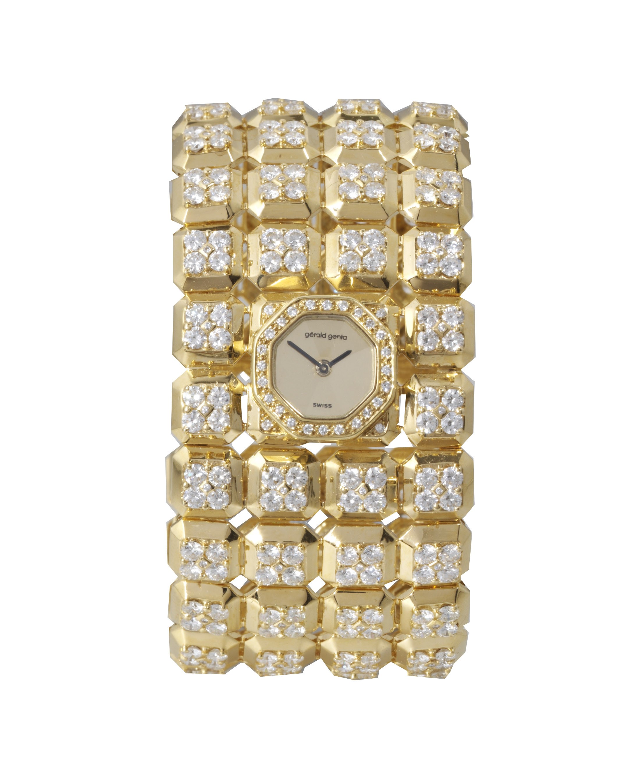 GERALD GENTA.
LADY'S 18K GOLD AND DIAMOND-SET BANGLE WATCH