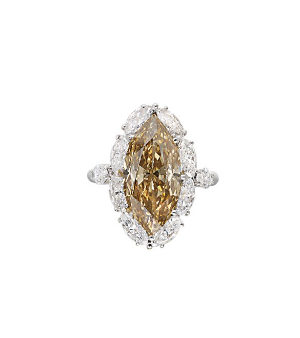 A COLOURED DIAMOND RING