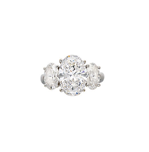 A FINE DIAMOND THREE-STONE RING
