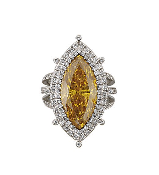 A RARE COLOURED DIAMOND RING