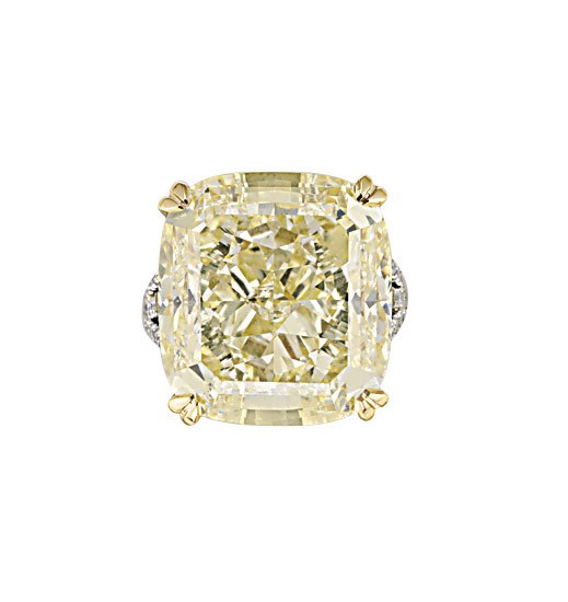 AN IMPORTANT COLOURED DIAMOND SINGLE-STONE RING