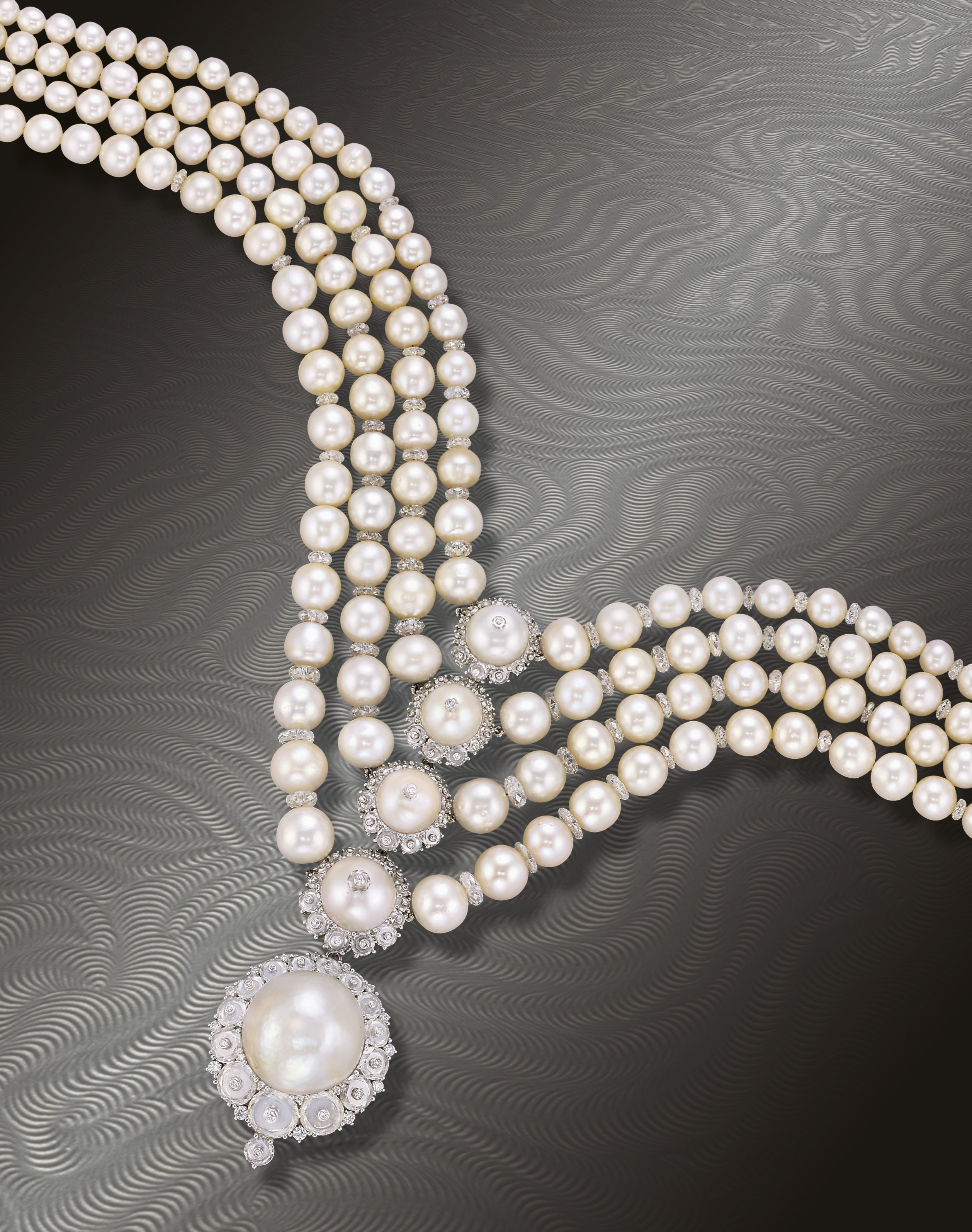A SUPERB NATURAL PEARL AND DIAMOND NECKLACE