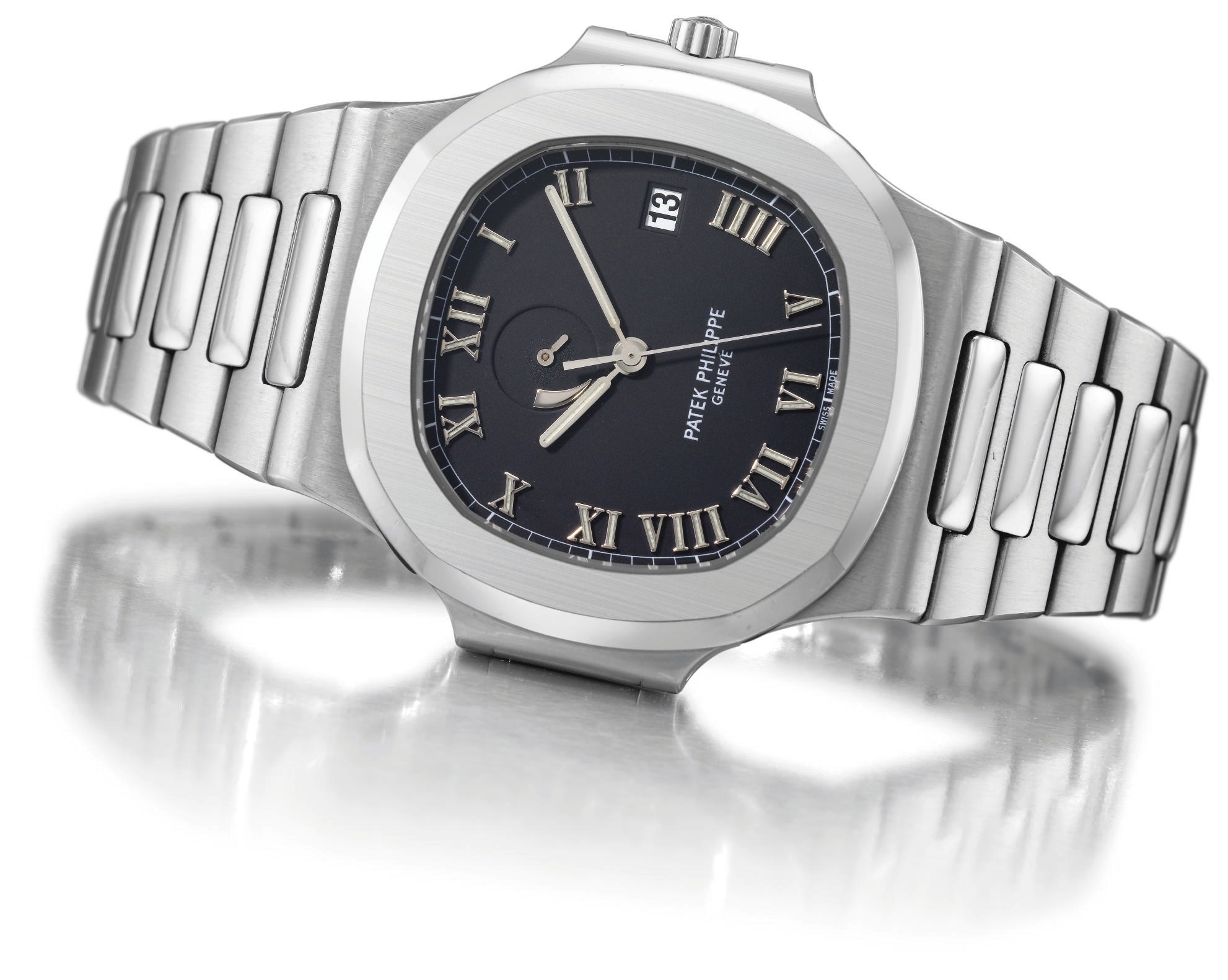 Patek Philippe. A stainless steel self-winding water-resistant wristwatch with sweep centre seconds, date, up and down indicator and bracelet