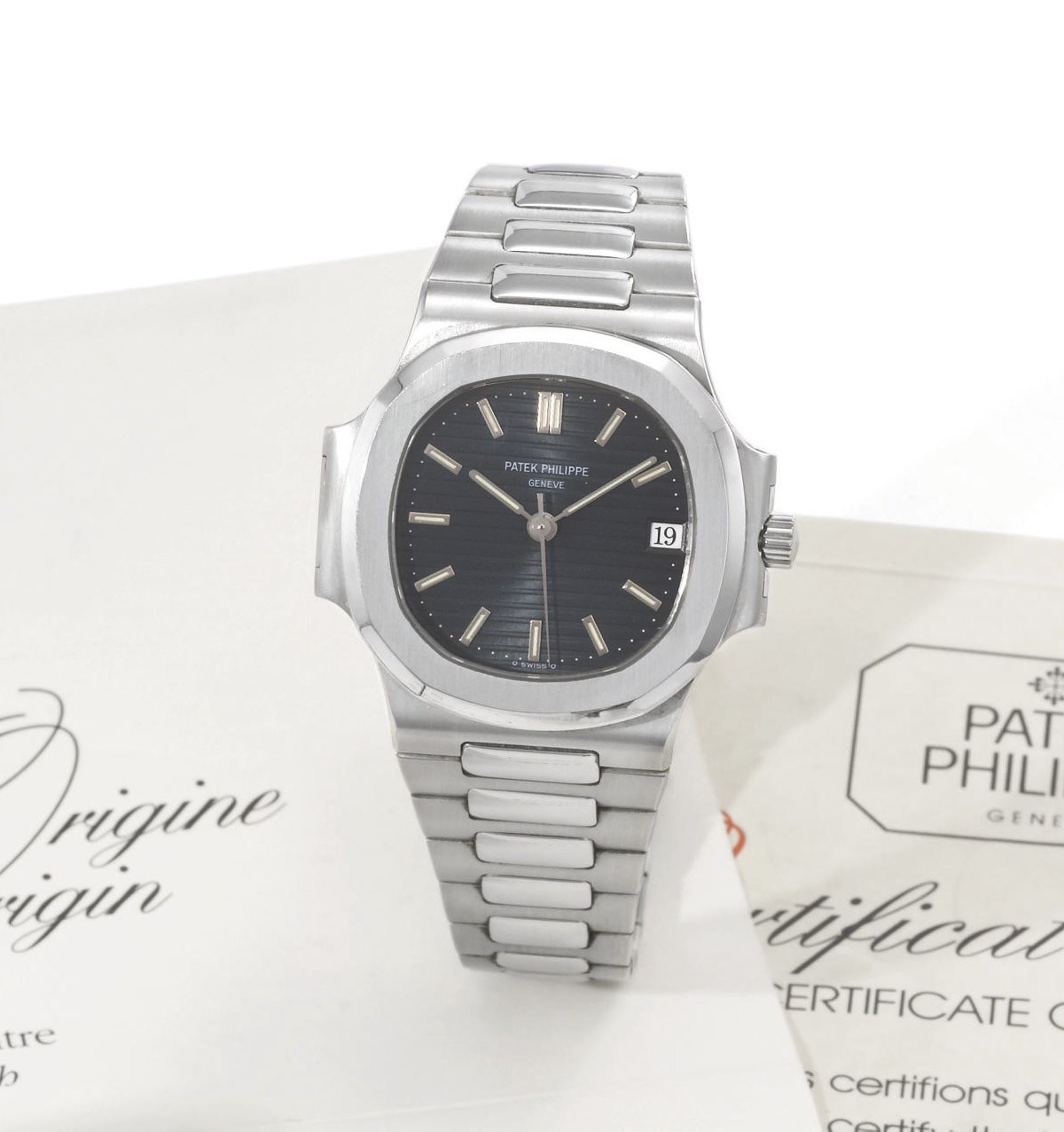 Patek Philippe. A stainless steel self-winding water-resistant wristwatch with sweep centre seconds, date, bracelet and original certificate