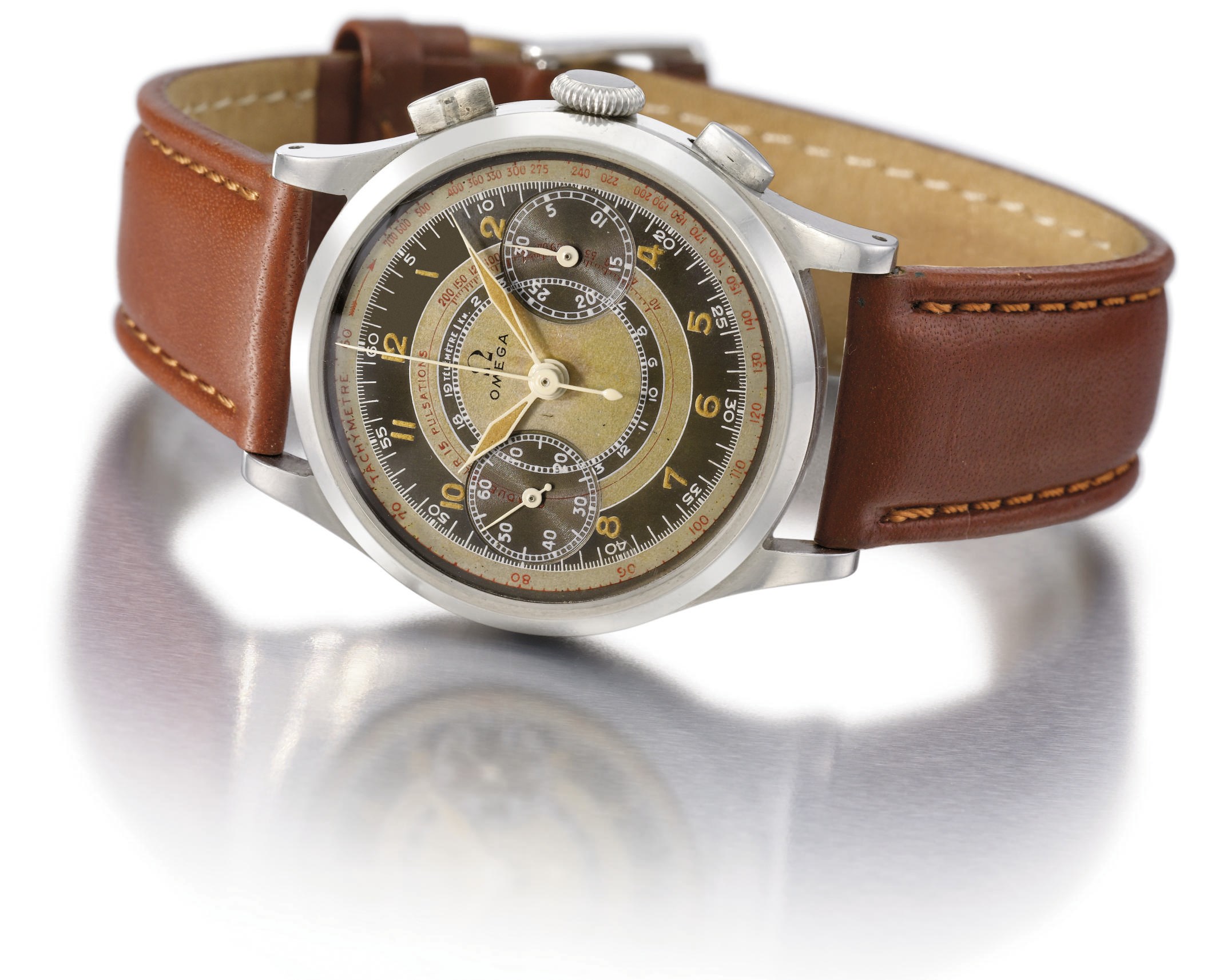 Omega. A fine and very attractive stainless steel water-resistant chronograph wristwatch with two-tone gilt and ochre-coloured dial and pulsometer scale