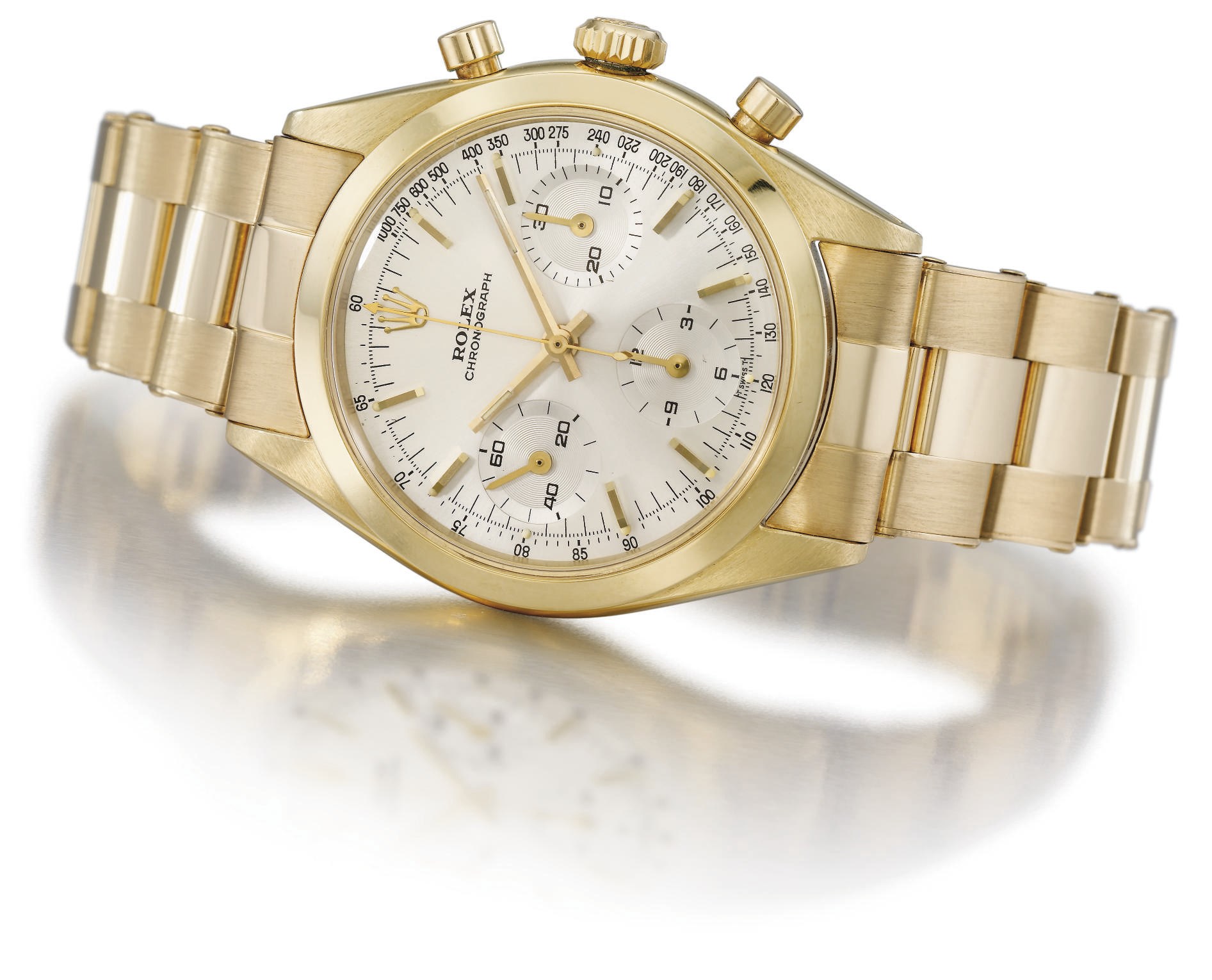 Rolex. A very fine and rare 18K gold water-resistant chronograph wristwatch with bracelet