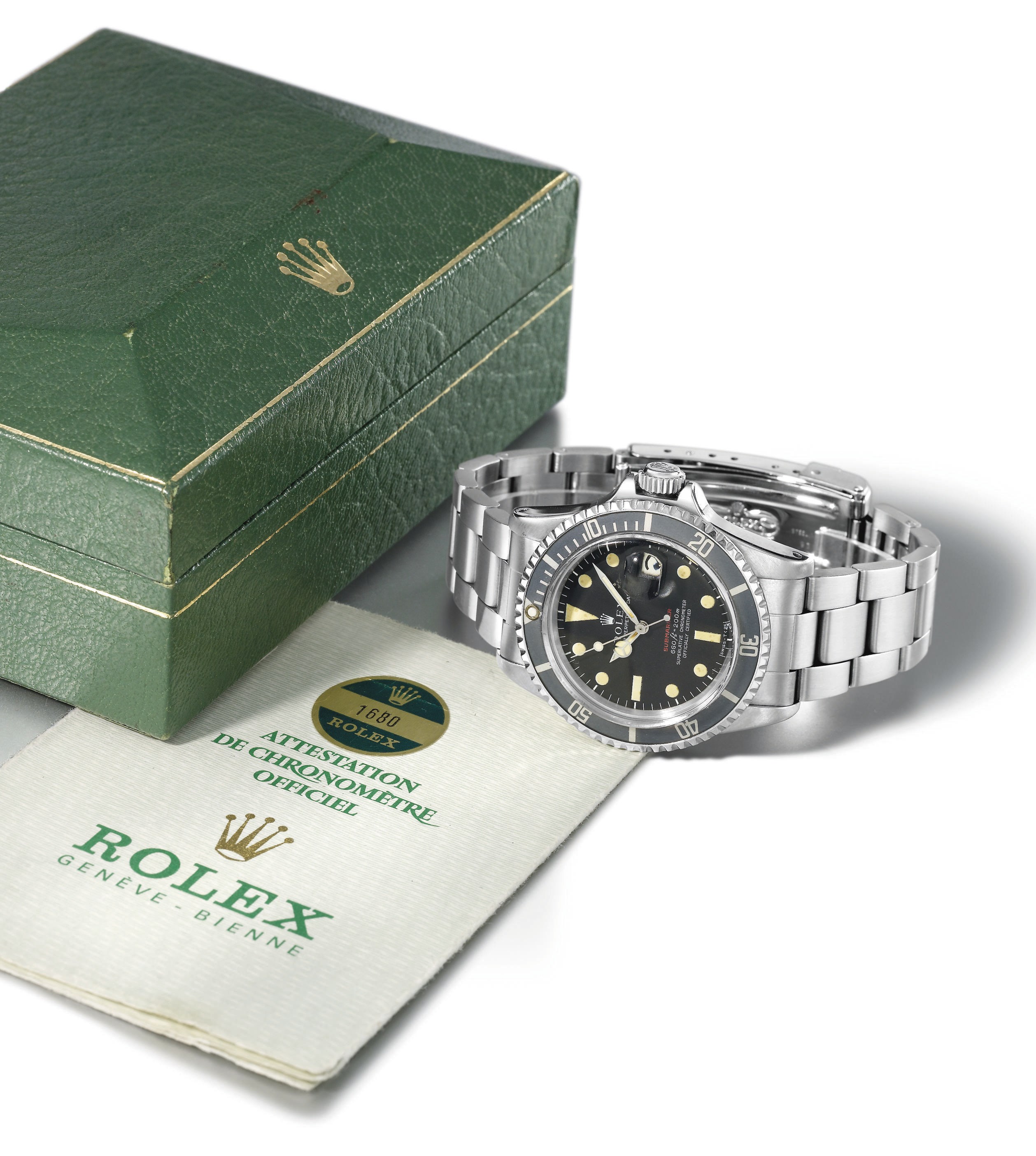 Rolex. A fine and rare stainless steel self-winding water-resistant wristwatch with sweep centre seconds, date, bracelet, original guarantee and box