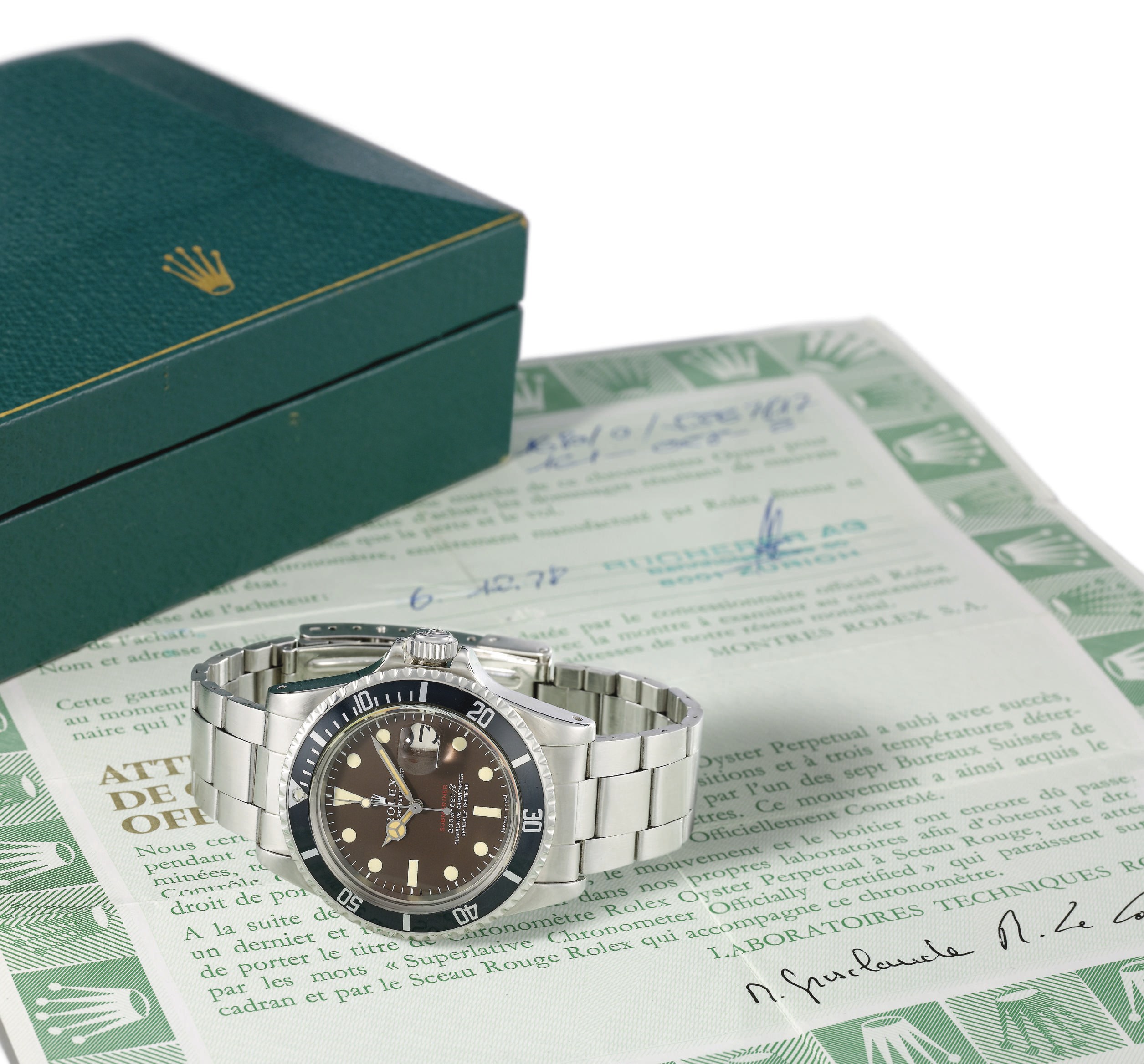 Rolex. A fine and rare stainless steel self-winding water-resistant wristwatch with sweep centre seconds, date, bracelet, original guarantee, box and brown-coloured dial
