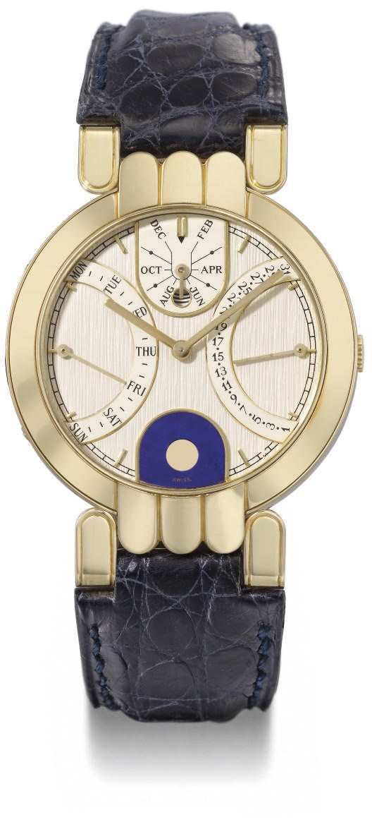Harry Winston. An 18K gold self-winding double retrograde perpetual calendar wristwatch with phases of the moon