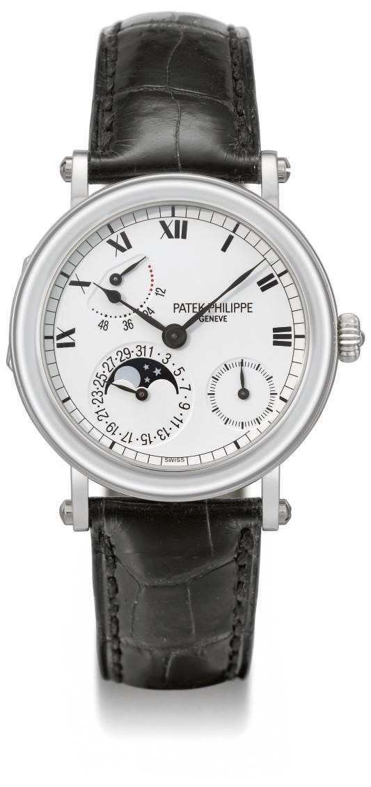 Patek Philippe. A fine platinum self-winding wristwatch with power reserve, date and phases of the moon