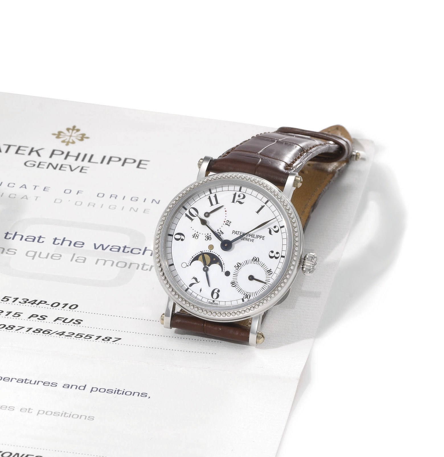 Patek Philippe. A fine platinum self-winding wristwatch with power reserve and phases of the moon