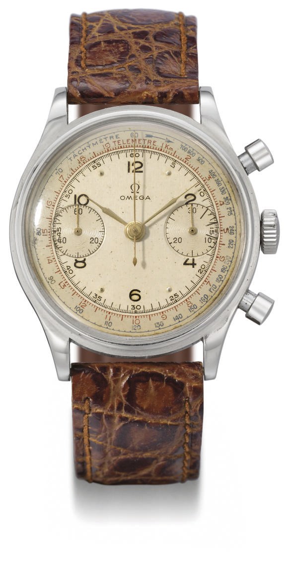 Omega. A large and attractive stainless steel water-resistant chronograph wristwatch with two-tone champagne dial