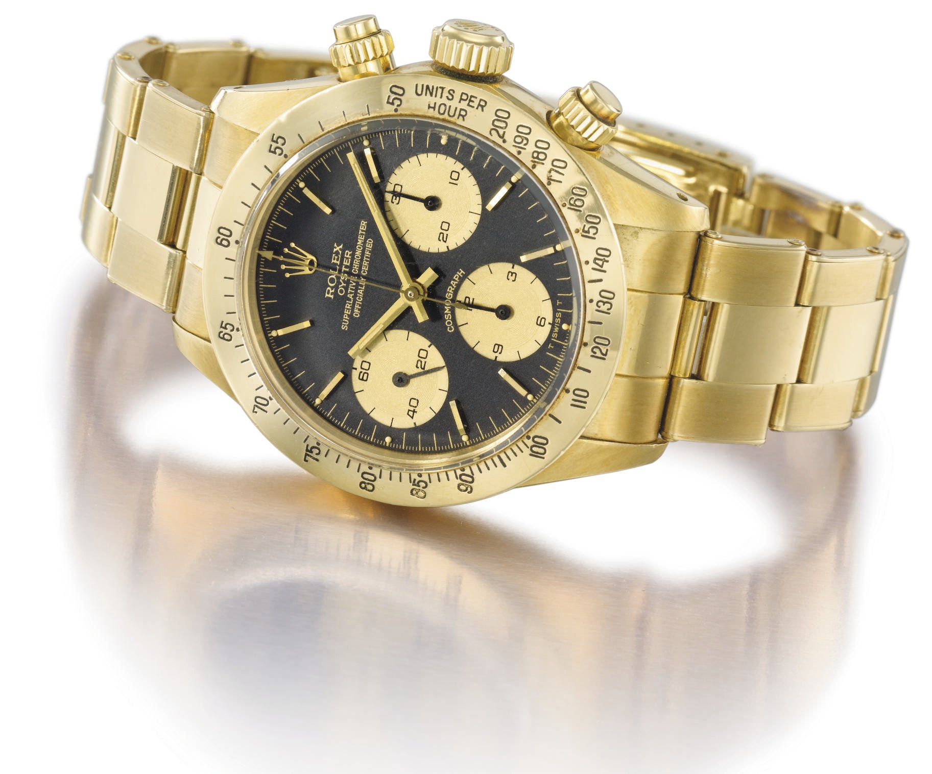 Rolex. A fine and rare 18K gold water-resistant chronograph wristwatch with bracelet