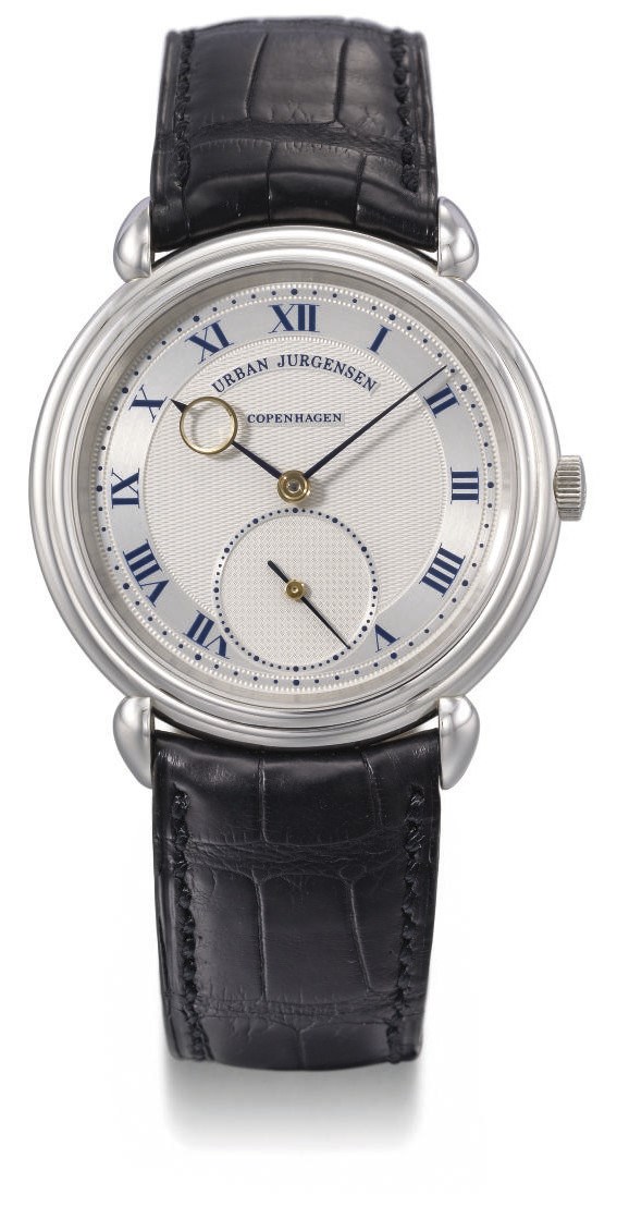 Urban Jürgensen. A fine and rare platinum twin barrel self-winding wristwatch