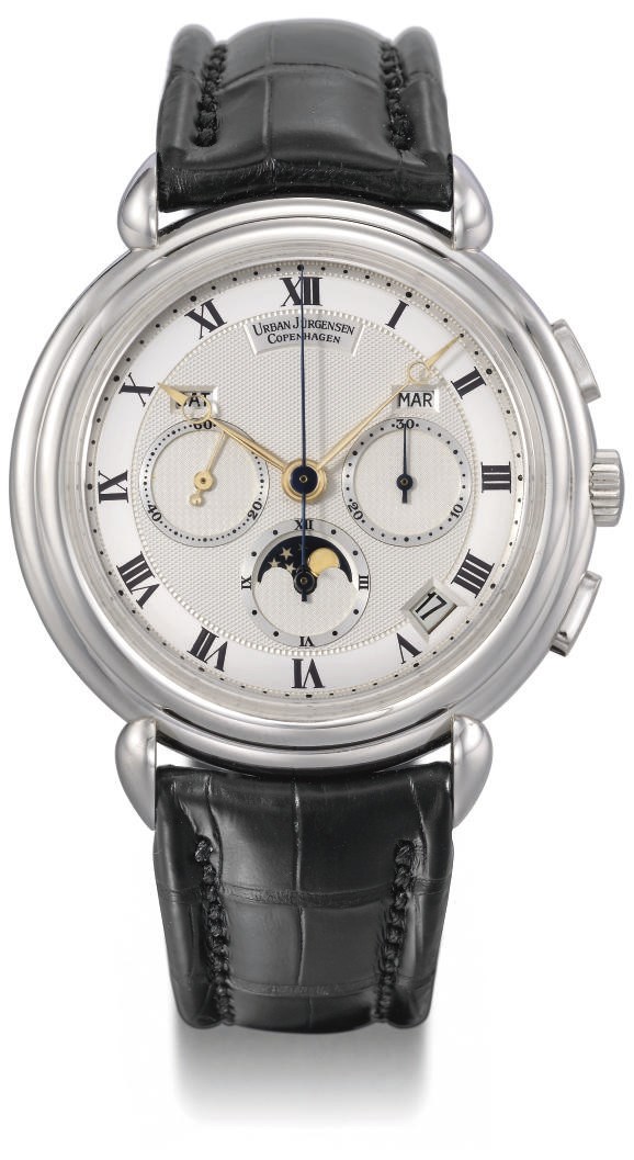 Urban Jürgensen. A fine and rare platinum limited series self-winding water-resistant calendar chronograph wristwatch with phases of the moon