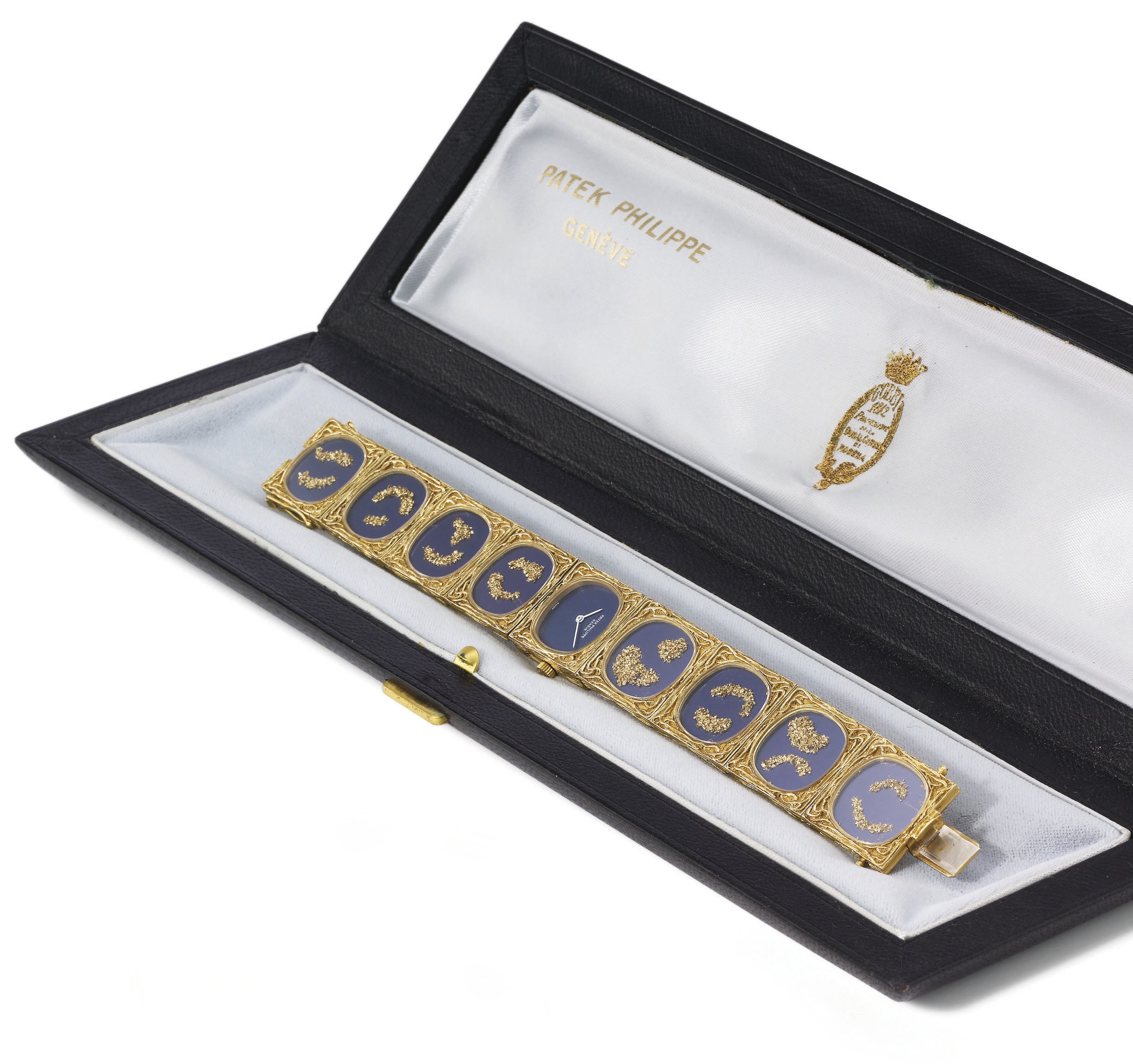 Patek Philippe. A rare and attractive 18K gold bracelet watch with "gold chip" decoration and box