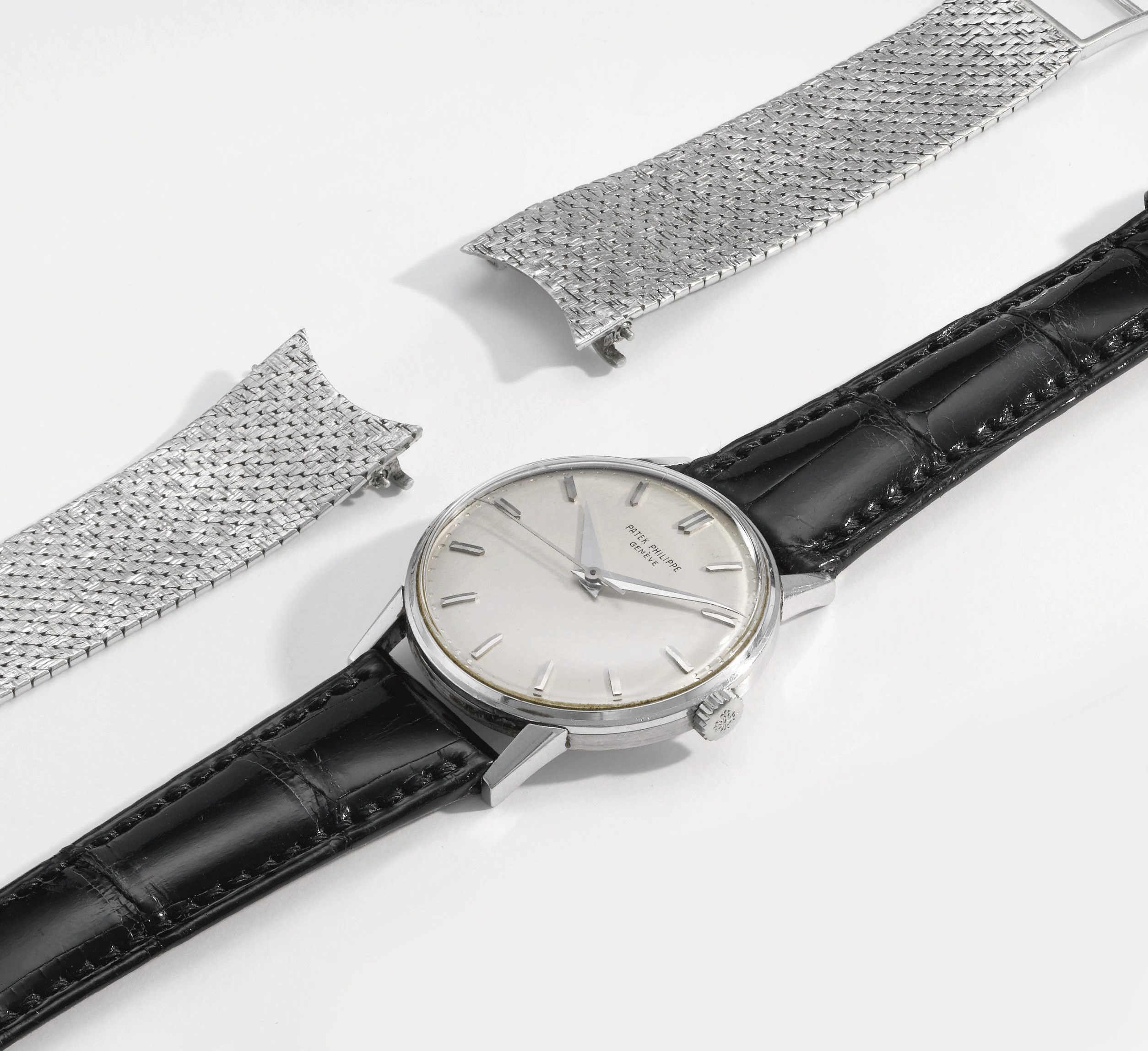 Patek Philippe. A fine and extremely rare 18K white gold wristwatch with sweep centre seconds, detachable white gold bracelet and box