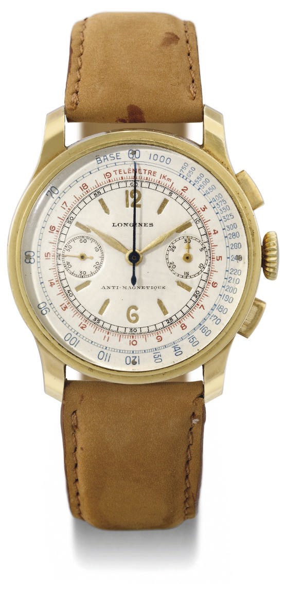 Longines. A fine and attractive 18K gold chronograph wristwatch