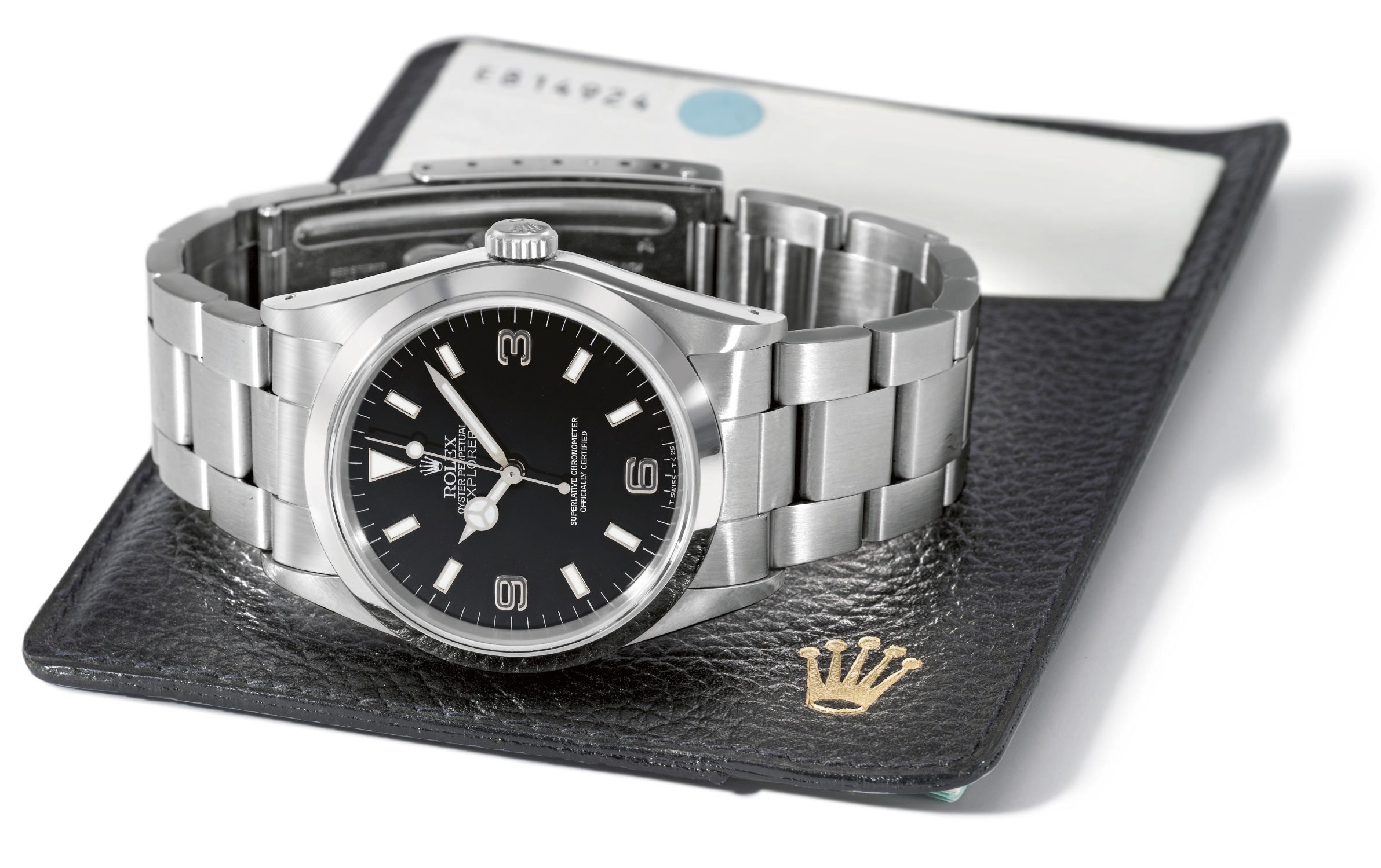 Rolex. A stainless steel self-winding water-resistant wristwatch with sweep centre seconds, black-out dial, bracelet and guarantee