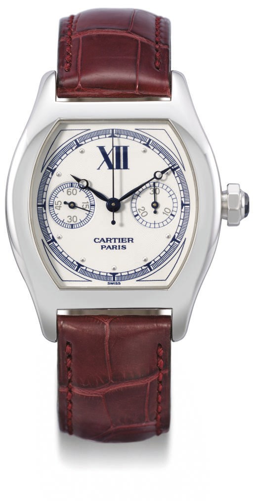 Cartier. A fine 18K white gold tonneau-shaped single button chronograph wristwatch