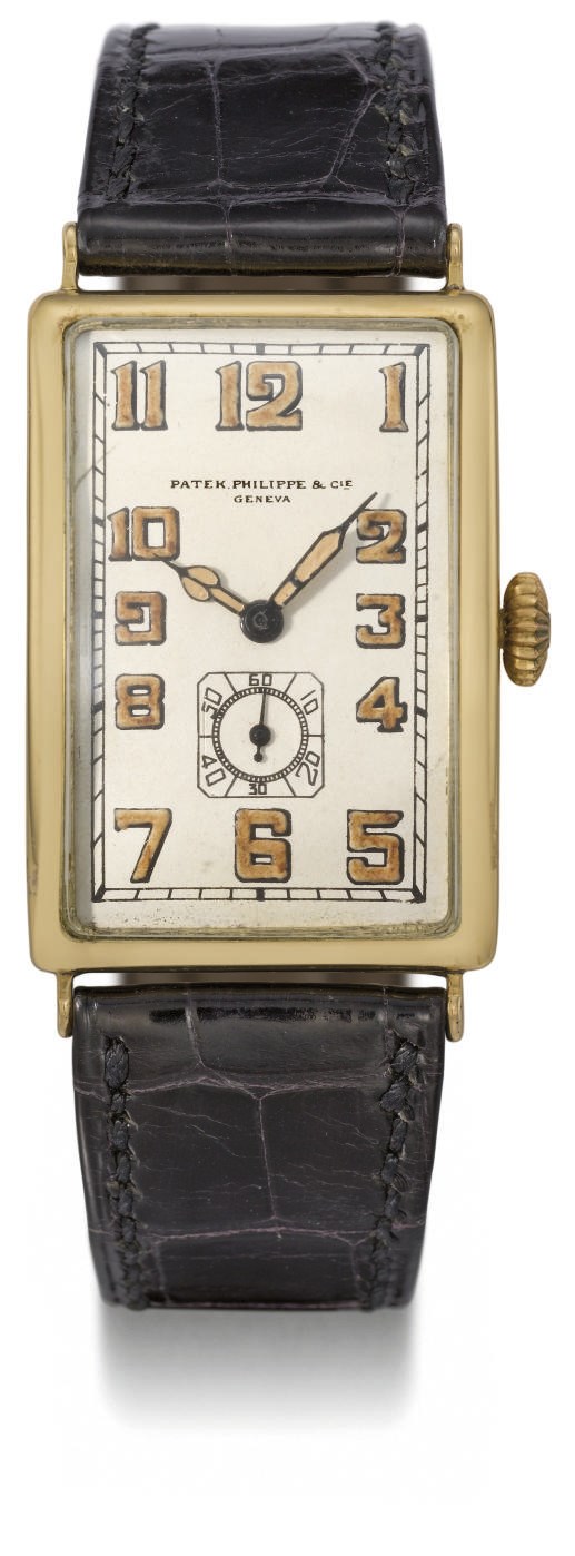 Patek Philippe. A fine and large 18K gold rectangular hinged curved wristwatch with luminous numerals