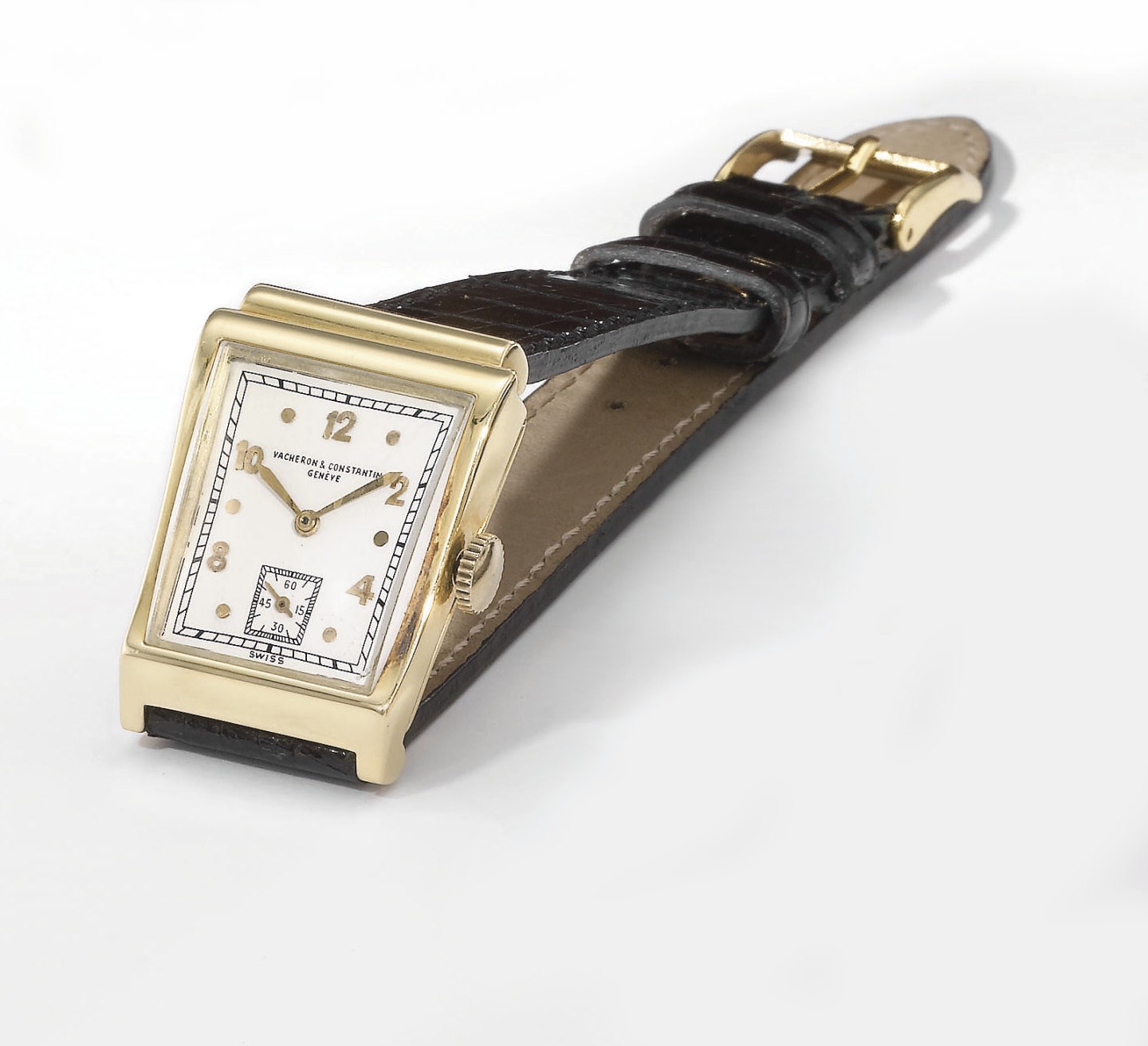 Vacheron Constantin. An unusual 18K gold trapezoid-shaped wristwatch with box