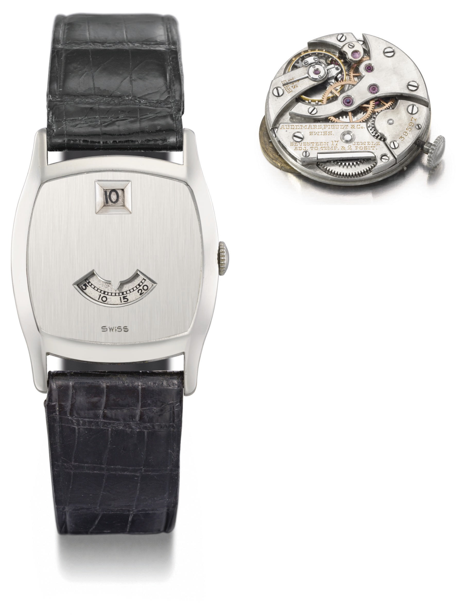 Audemars Piguet. A very fine and rare 18K white gold cushion-shaped jump hour "digital" wristwatch