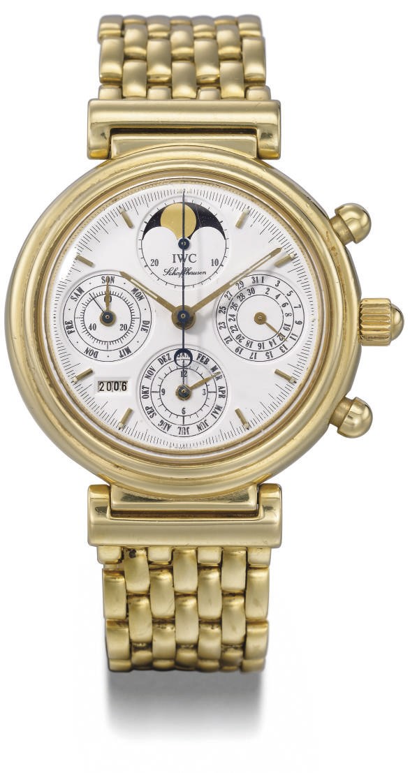 IWC. A fine 18K gold self-winding perpetual calendar chronograph wristwatch with phases of the moon, year indicator and bracelet