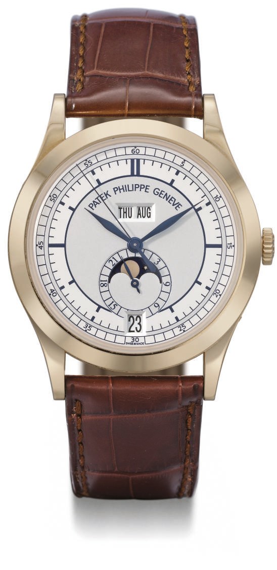 Patek Philippe. A fine 18K pink gold self-winding annual calendar wristwatch with sweep centre seconds and phases of the moon