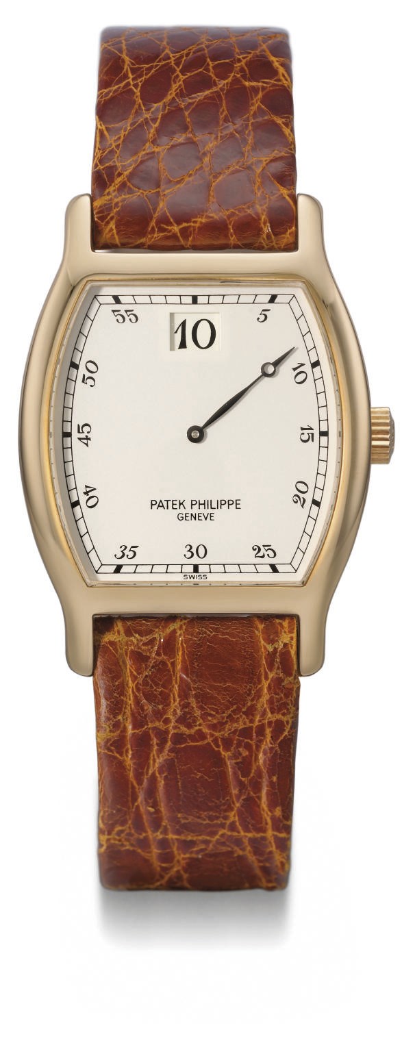 Patek Philippe. A very fine and rare 18K pink gold limited edition tonneau-shaped jump hour wristwatch with original certificate and box, made for the company's 150th anniversary