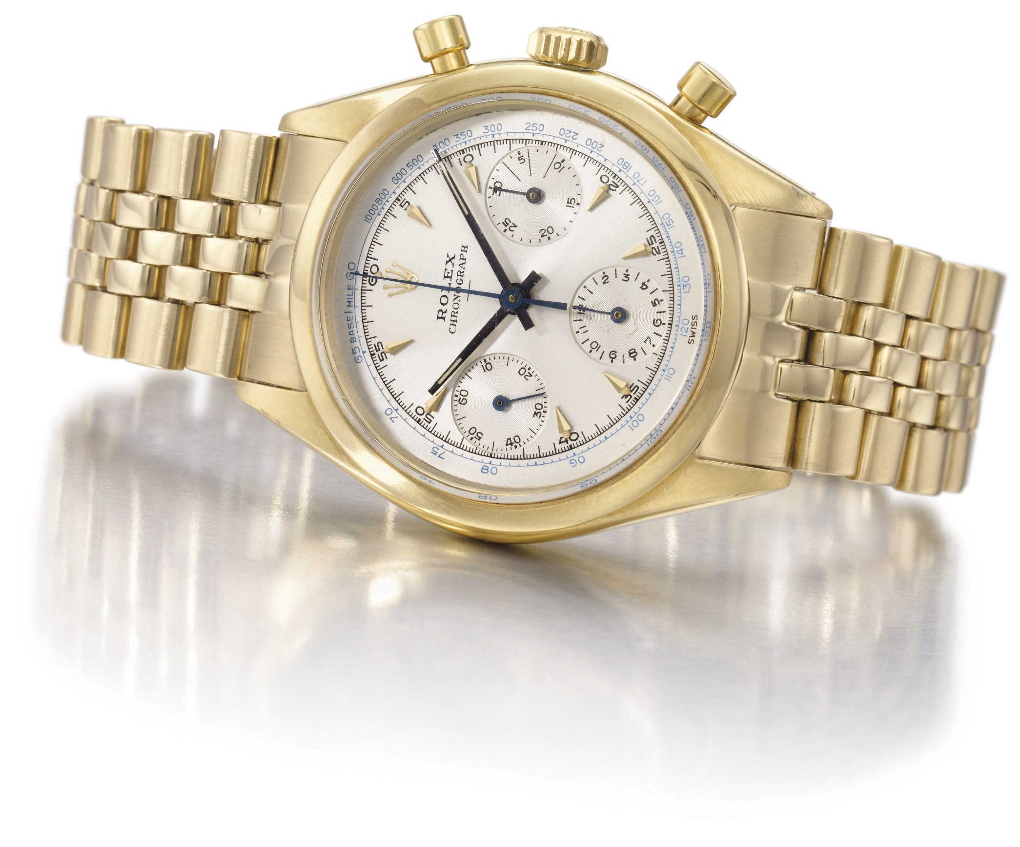 Rolex. A very fine and rare 14K gold chronograph wristwatch with bracelet and transitional dial