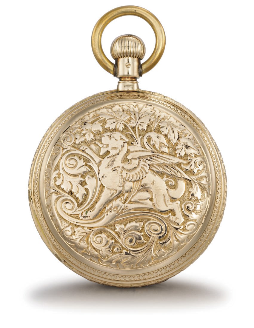Assmann. A fine 14K gold hunter case keyless lever watch with richly engraved case