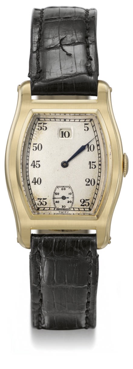 Meylan. An unusual 18K gold tonneau-shaped jump hour wristwatch