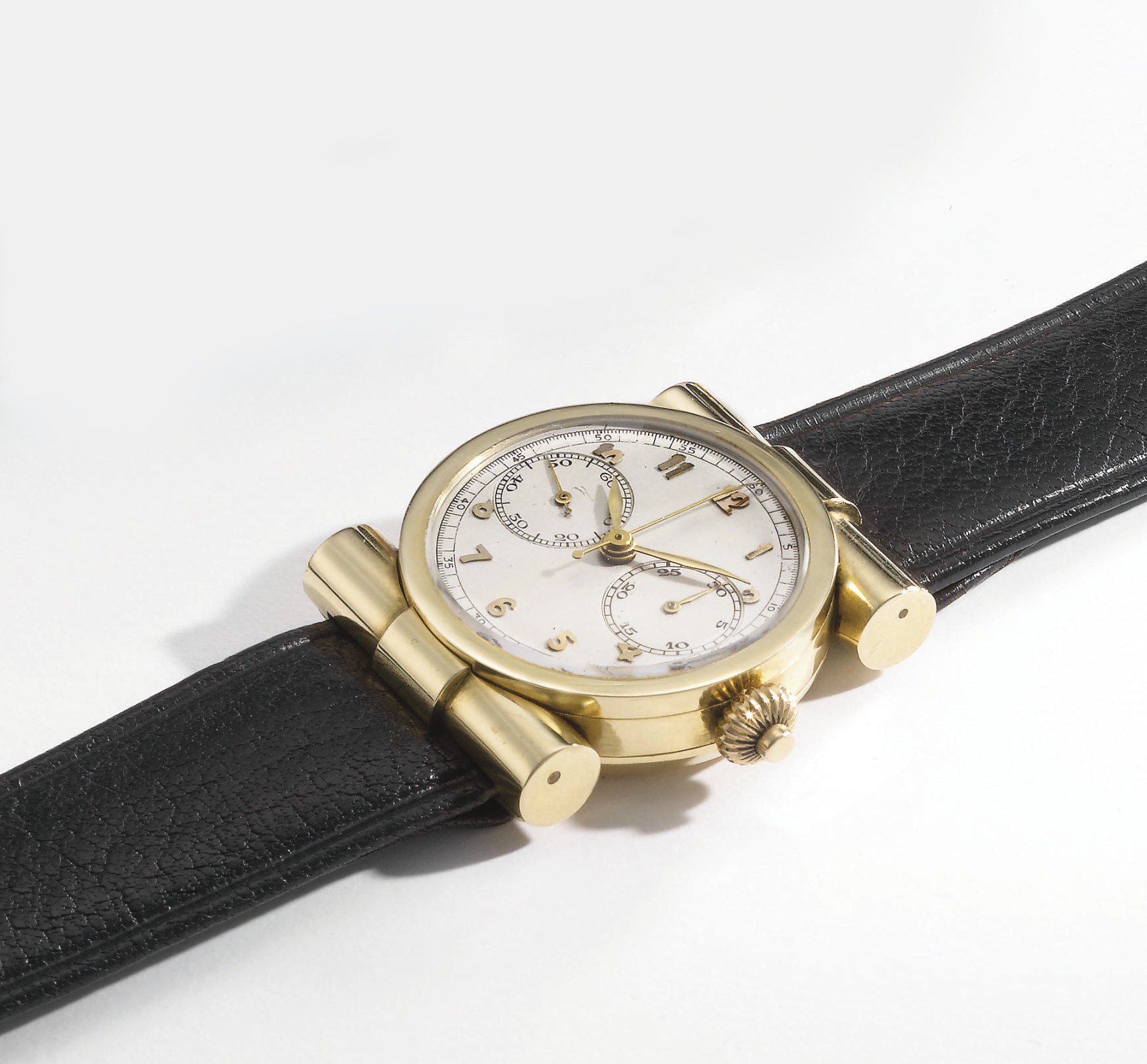 Swiss. A lady's unusual 18K gold single button chronograph wristwatch