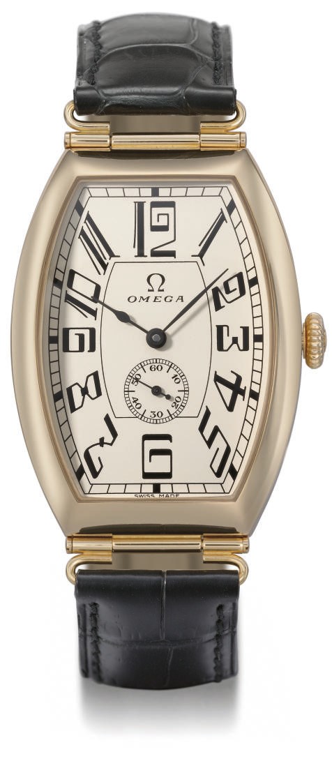 Omega. A fine and rare 18K pink gold limited edition tonneau-shaped self-winding wristwatch