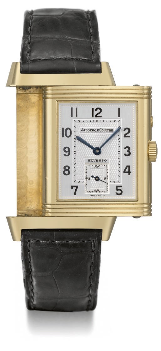 Jaeger-LeCoultre. A fine and large 18K gold double dial dual time Reverso wristwatch with 24 hour indication
