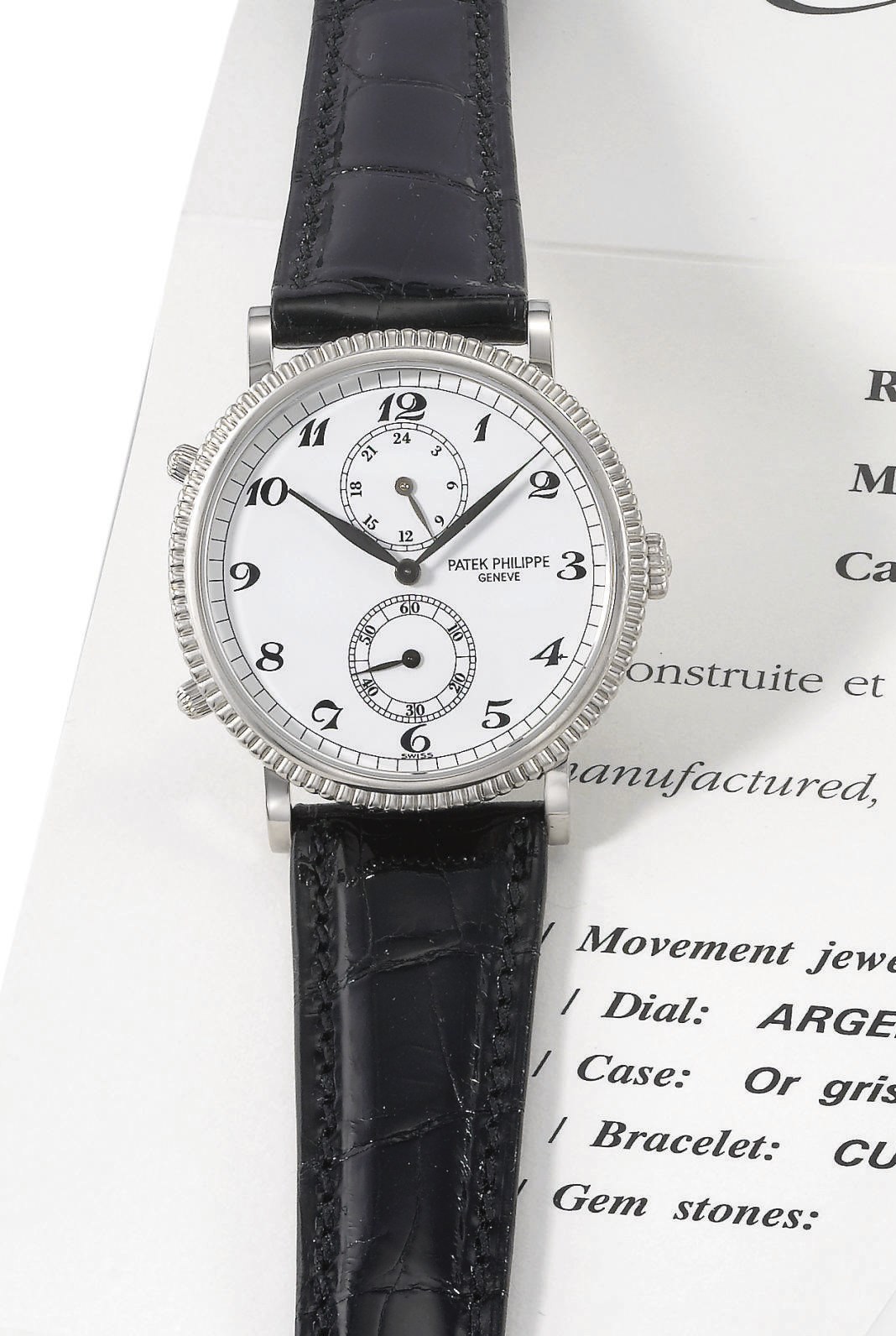 Patek Philippe. A rare 18K white gold two time zone wristwatch