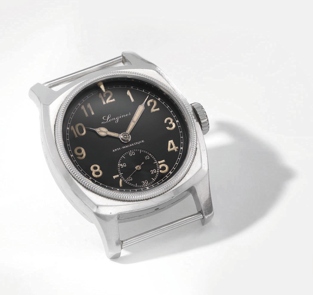 Longines. A large and unusual cushion-shaped stainless steel military wristwatch with black dial, made for the Czechoslovakian Army