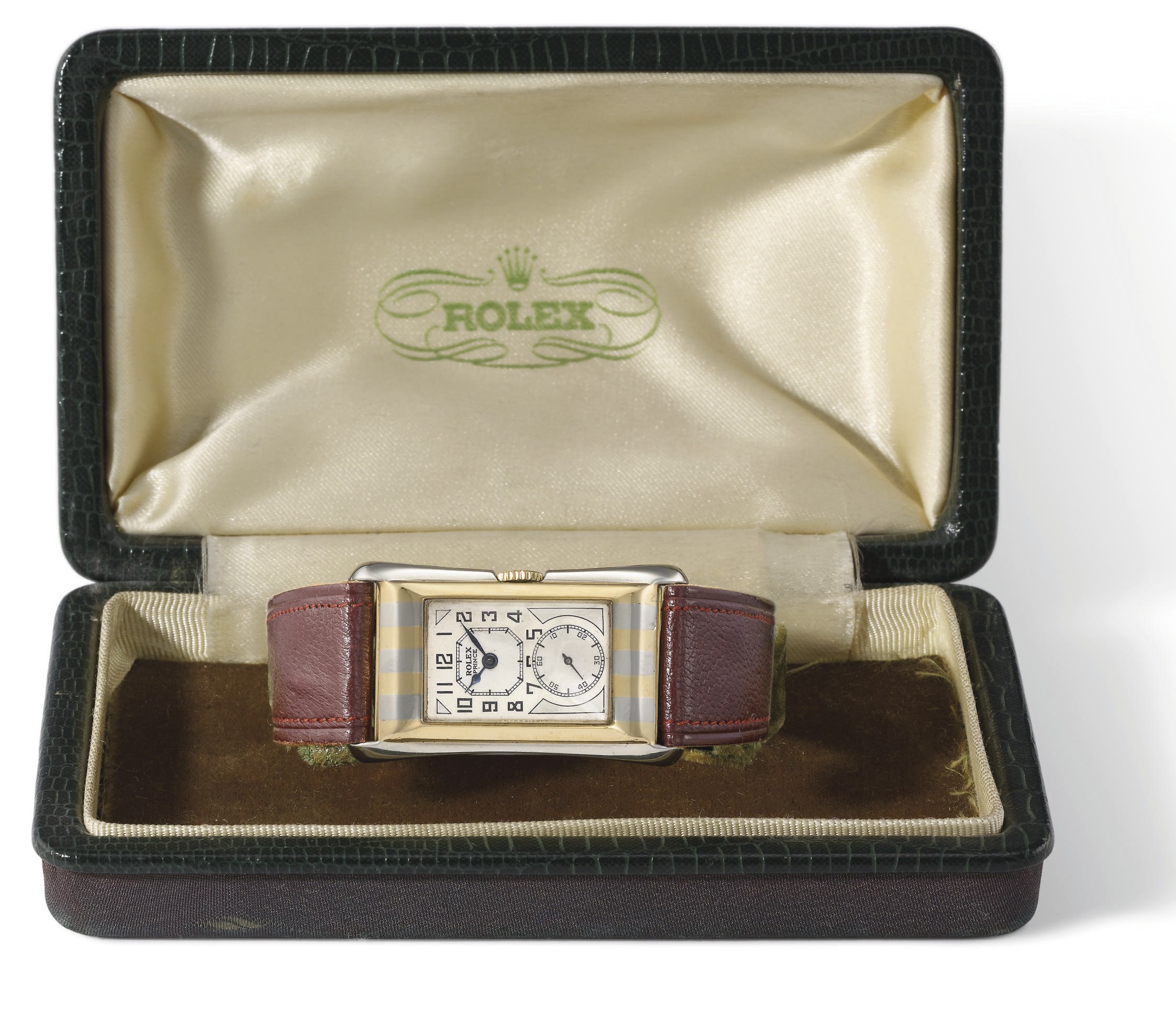Rolex. A fine and rare 18K two colour gold rectangular doctor's wristwatch with two-tone silvered dial