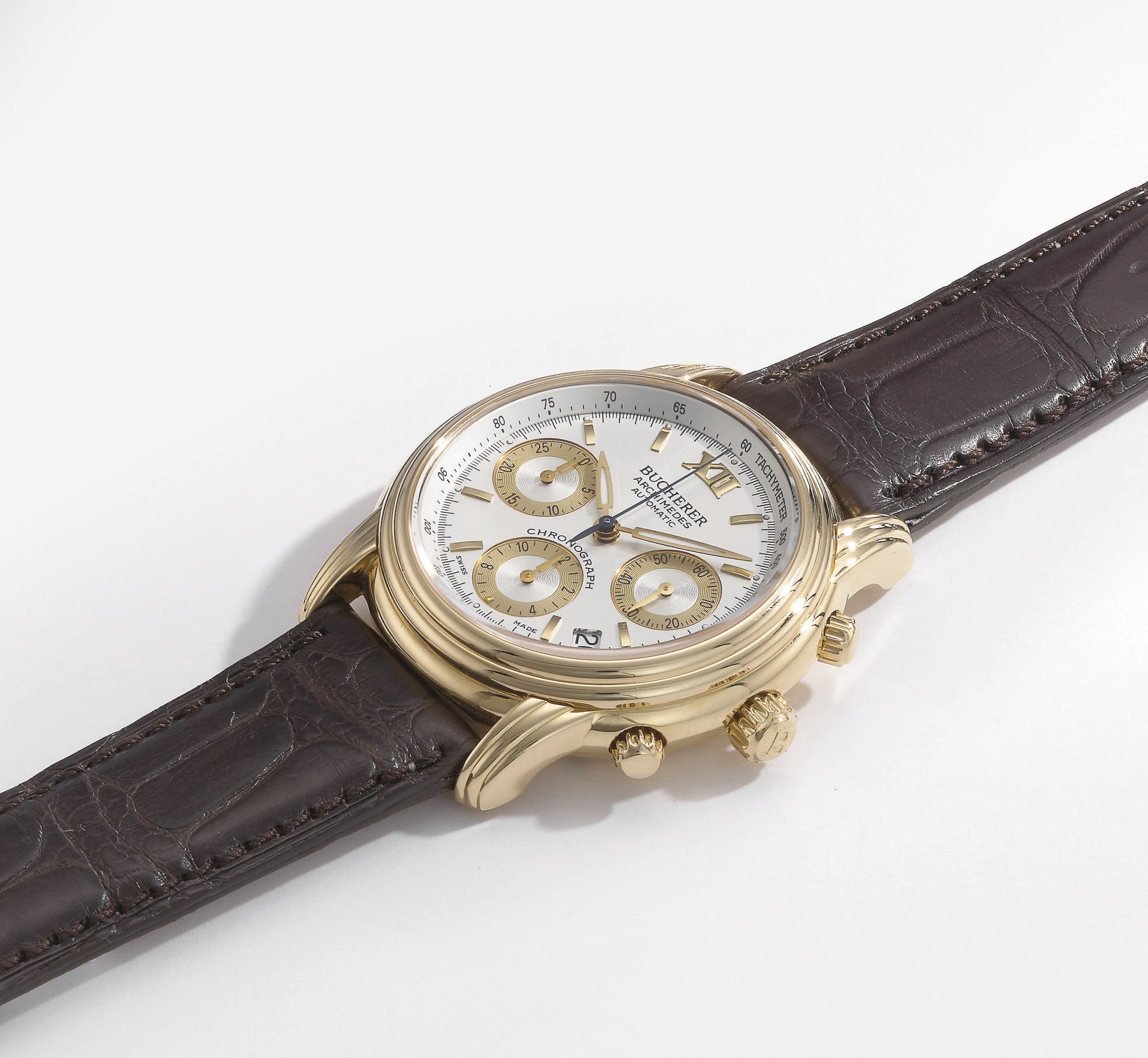 Bucherer. An 18K gold self-winding chronograph wristwatch with date