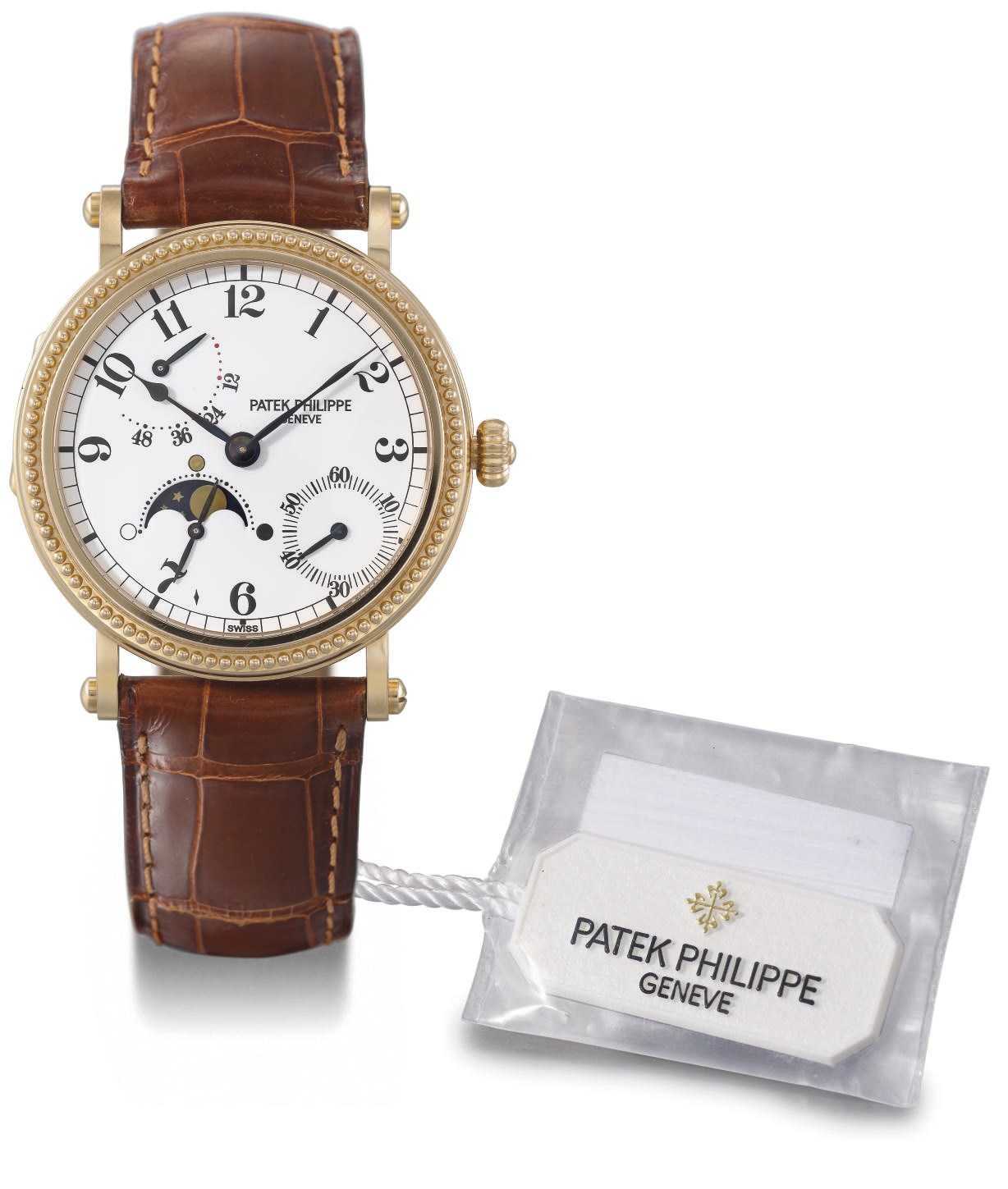 Patek Philippe. A fine 18K pink gold self-winding wristwatch with power reserve and phases of the moon