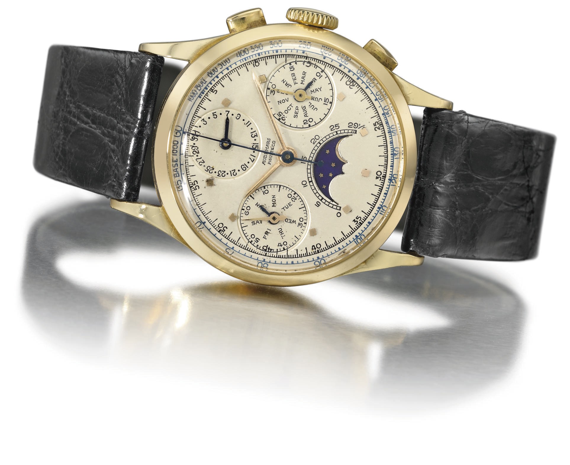 Audemars Piguet. A fine, rare and unusual 18K gold full calendar chronograph wristwatch with phases of the moon
