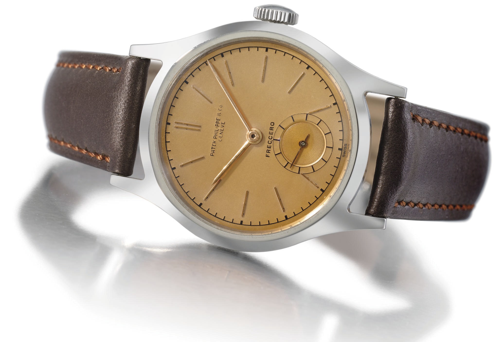 Patek Philippe. A fine, rare and attractive stainless steel water-resistant wristwatch with pink dial