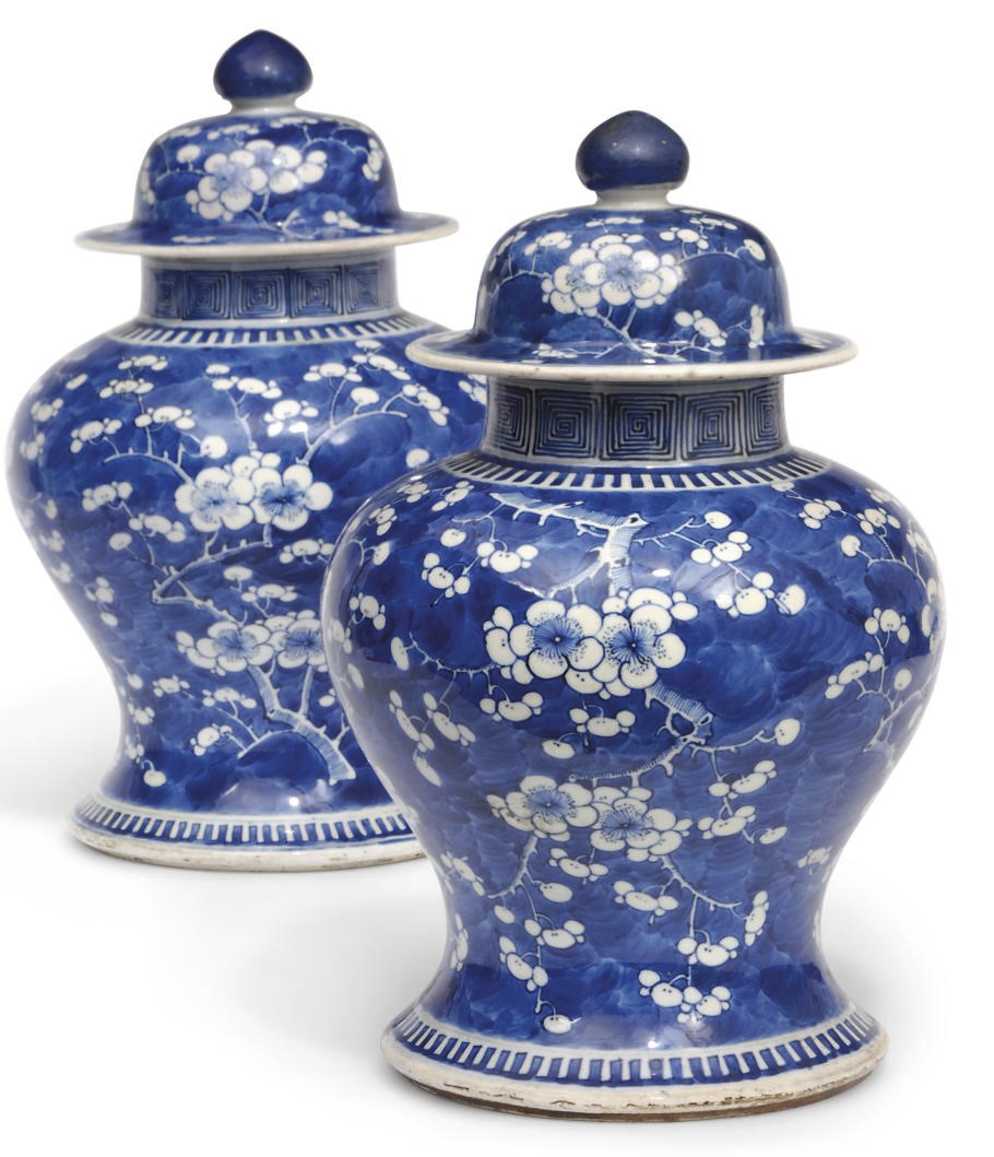 A pair of Chinese prunus jars and covers