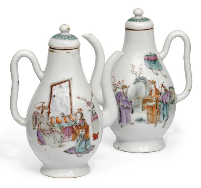 A Pair of Famille Rose Ewers and covers